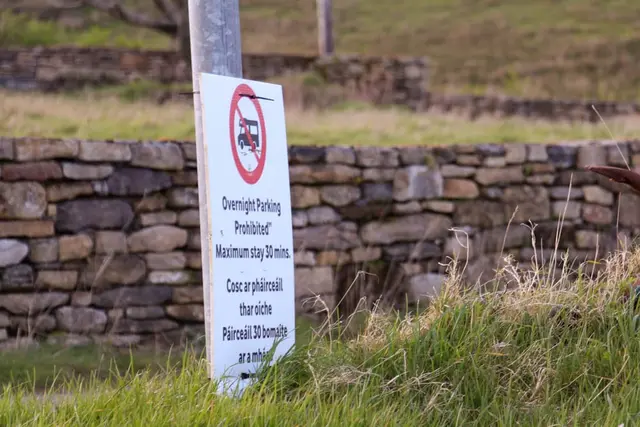 a sign on a post