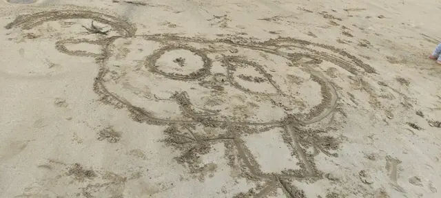 a beach with footprints