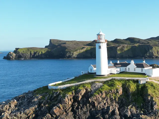 a lighthouse on a rocky island
