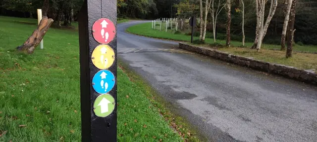 a sign on the side of a road